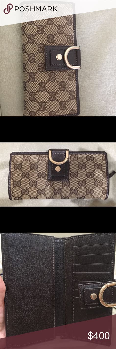 checkered gucci wallet.